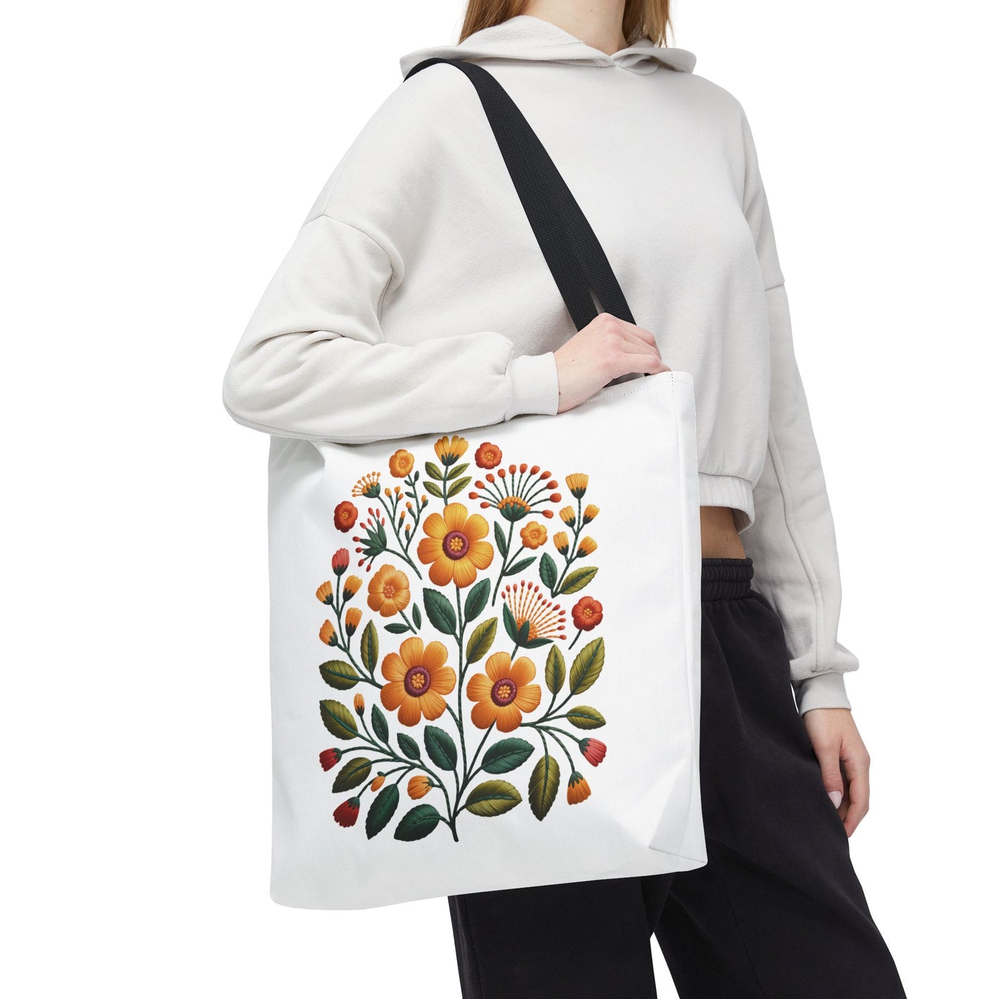 Folk Art Floral Faux Embroidery Style Tote Bag with warm yellow and earth-toned floral design, featuring olive green leaves and burnt orange accents, ideal for nature lovers and art enthusiasts.