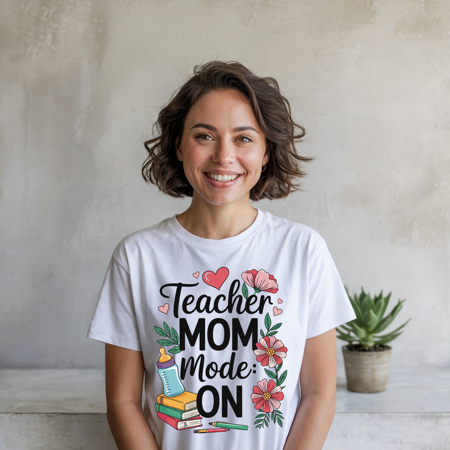 Teacher Mom Mode On T-Shirt featuring a relaxed fit and crew neckline, showcasing a playful design ideal for busy teacher moms, embodying the comfort and uplifting style of FireBrook Essentials.