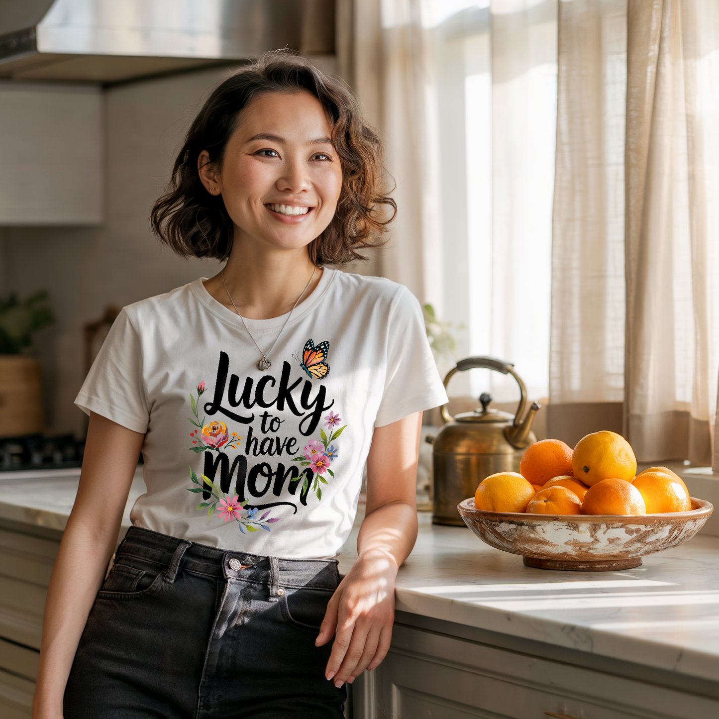 Lucky to Have Mom T-Shirt: A unisex jersey short-sleeve tee featuring a heartfelt phrase, crafted from lightweight 100% Airlume cotton, offering a comfortable retail fit with a crew neckline.