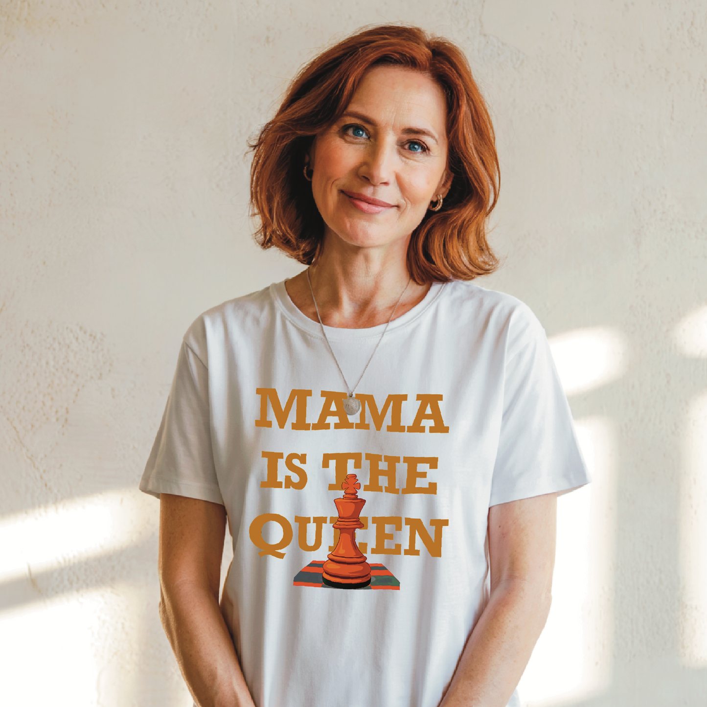 Mama is the Queen T-Shirt featuring a minimalistic design, emphasizing comfort and style, perfect for casual or semi-formal wear, aligning with FireBrook Essentials' uplifting and joyful apparel ethos.
