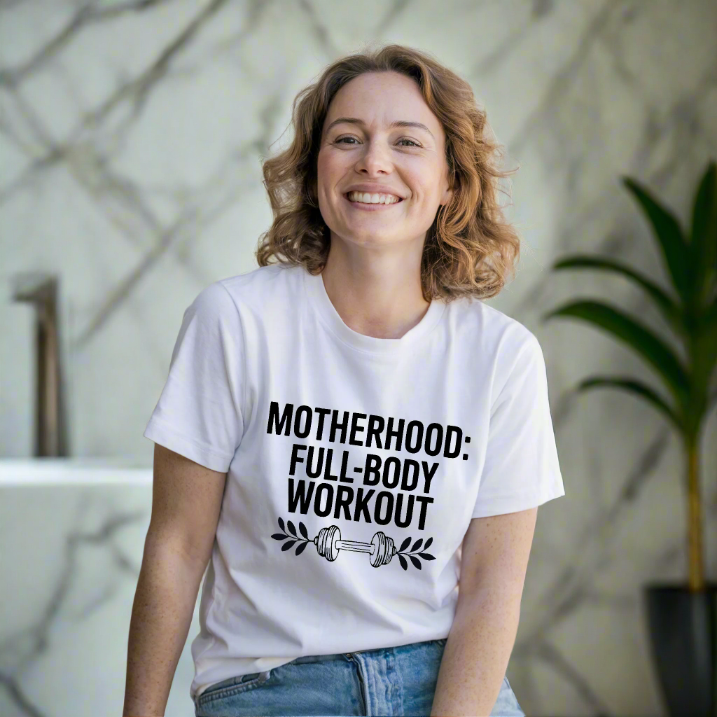 Motherhood: Full Body Workout T-shirt featuring a relaxed fit and crew neckline, showcasing durable double-needle stitching and soft garment-dyed fabric, perfect for active mothers seeking comfort and style.