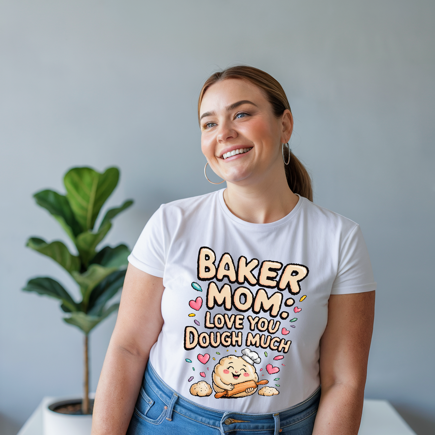 Baker Mom: Love You Dough Much T-Shirt, a comfy unisex tee, features a charming baking-themed design. Ideal for casual wear or special occasions, it embodies FireBrook Essentials' commitment to comfort and positivity.