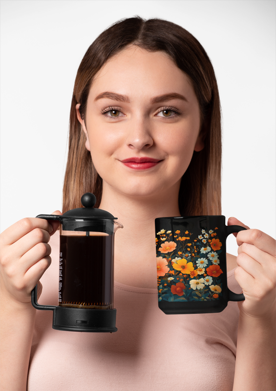Vibrant Floral Mug (11oz, 15oz) held by a woman, showcasing a whimsical zinnia and wildflowers design, perfectly blending nature-inspired beauty with functionality for a cozy tea or coffee experience.