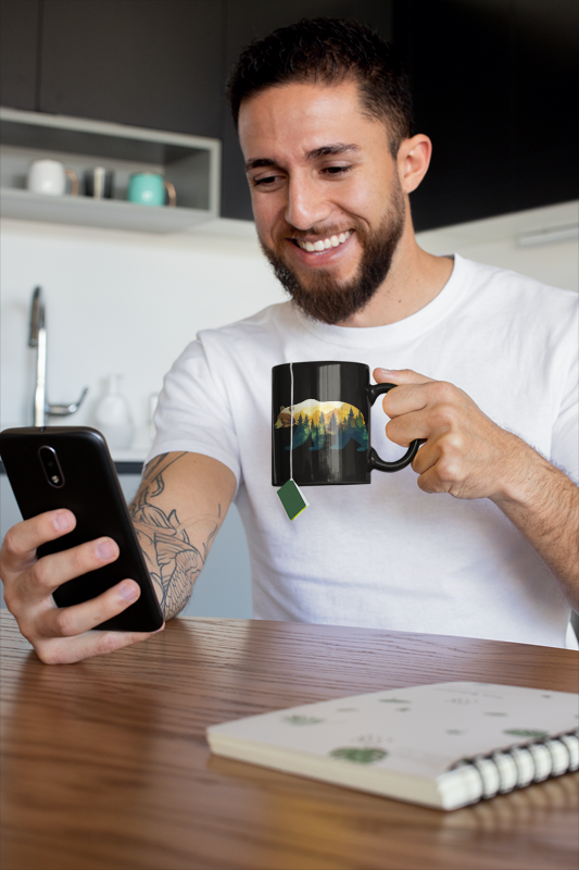 Bear in the Woods Mountain Mug (11 oz, 15 oz) with a rustic bear and woods design, ideal for nature lovers, shown as a glossy, lead-free ceramic piece, perfect for gifting.