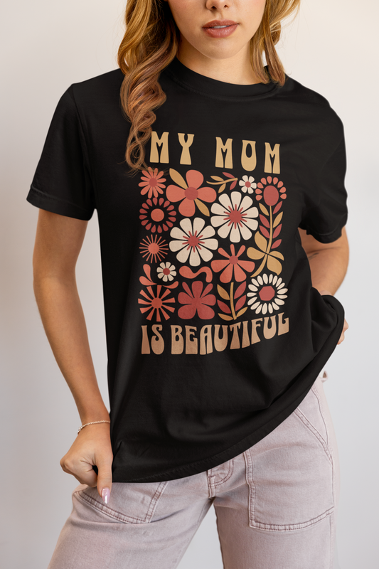 A person wearing a casual, floral-patterned top from FireBrook Designs, showcasing a stylish, comfortable fit. The design embodies the brand's uplifting and joyful essence.