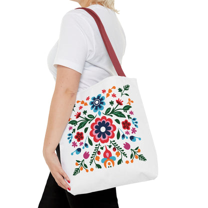 Woman carrying Floral Tote Bag with colorful flower design, ideal for daily errands or travel, embodying style and functionality from FireBrook Essentials.