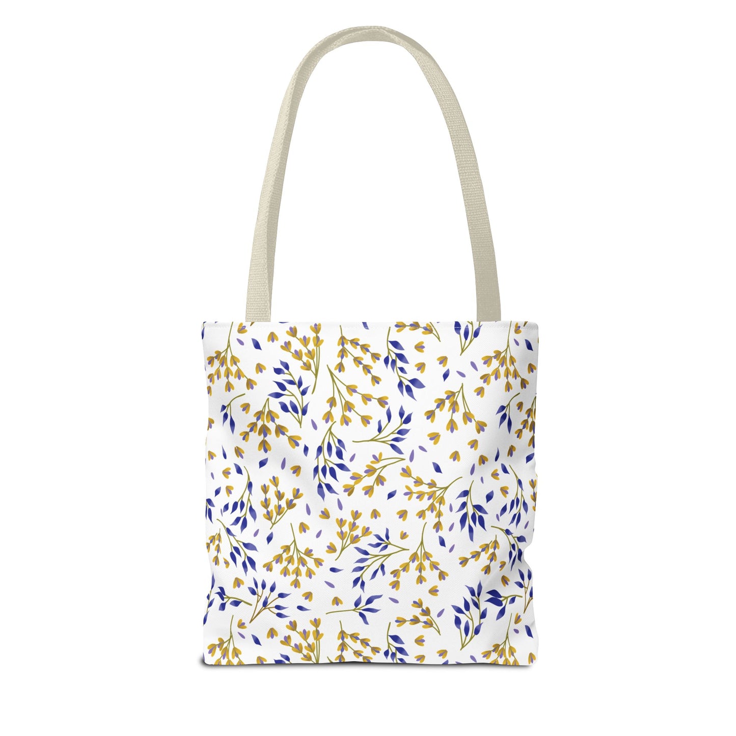 Floral Tote Bag with white body featuring a gold-yellow and blue botanical pattern, beige handles. Ideal for summer outings, reflecting FireBrook Essentials' commitment to uplifting, joyful designs.