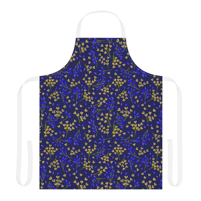 Floral Apron from FireBrook Designs features a deep navy blue with yellow and cobalt-blue botanical sprigs. Made of stain-free polyester canvas, it offers comfort and style with white neck and waist ties.