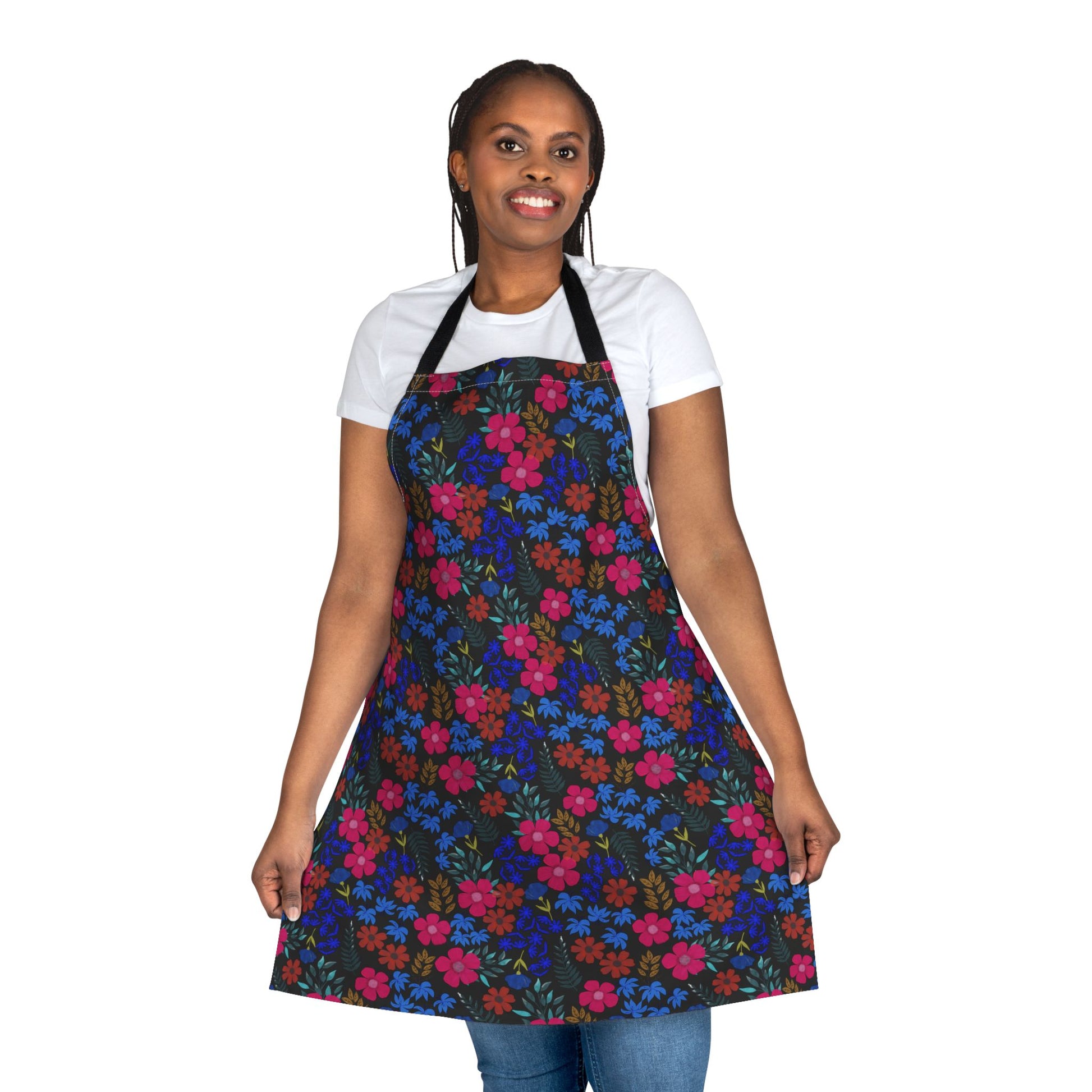 Person wears an Apron Floral Design with vibrant red, pink, and blue flowers, showcasing style and comfort. Ideal for various activities, reflecting FireBrook Essentials' commitment to uplifting, joyful apparel.