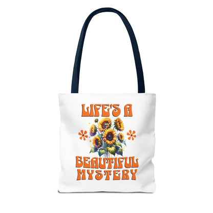 Life's A Beautiful Mystery Tote Bag with orange and yellow floral design, featuring durable polyester material and reinforced handles, perfect for exploring life's surprises.