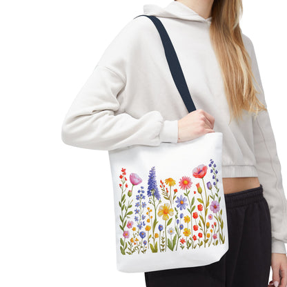 Wildflowers Tote Bag featuring a vibrant wildflower design, perfect for nature enthusiasts. Constructed from durable polyester with reinforced handles, ideal for daily use. Available in three sizes for versatile needs.