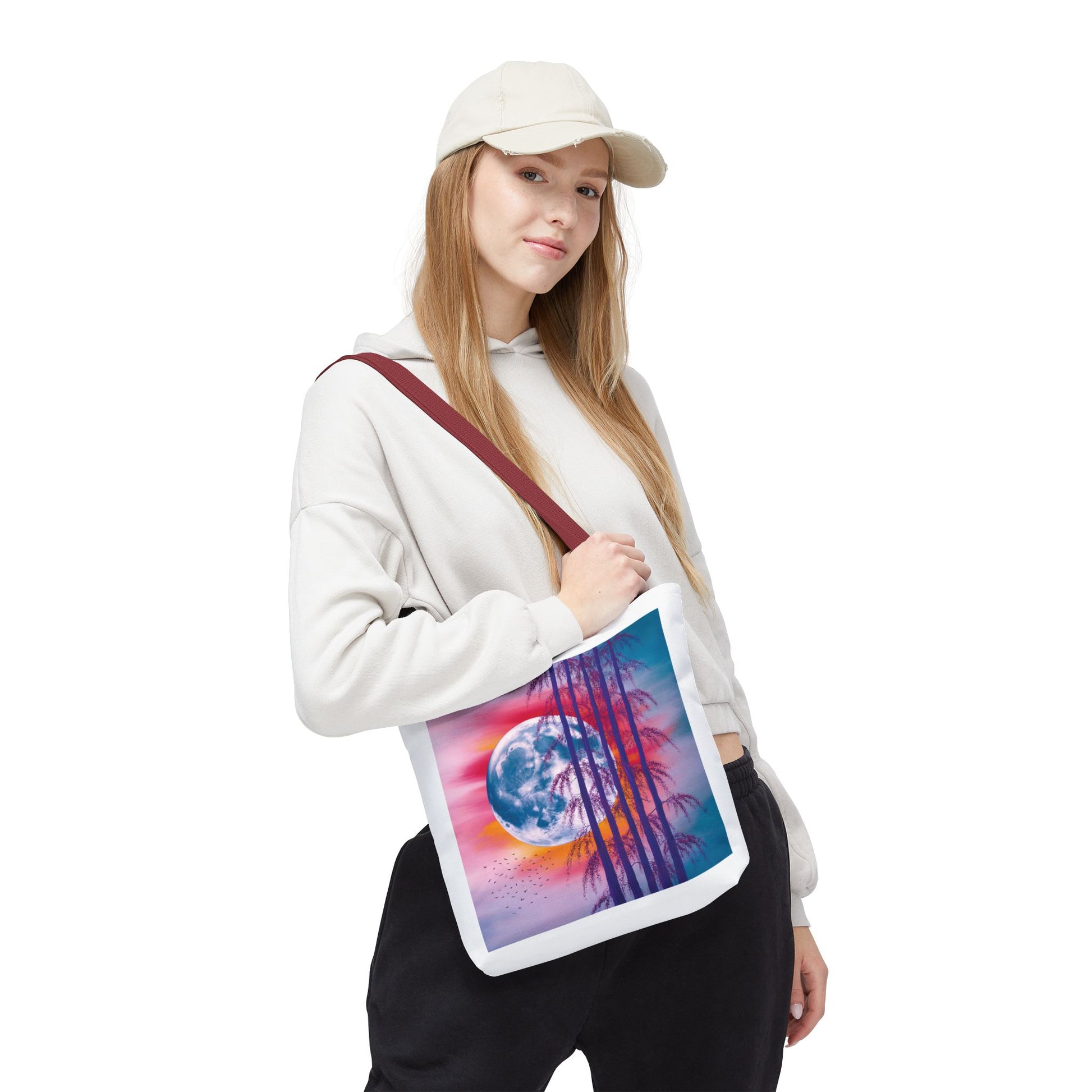 Moonlit Landscape Tote Bag featuring an abstract full moon and silhouetted trees against a fiery sunset, embodying dramatic energy. Ideal for nature lovers and artists, offered by FireBrook Essentials.