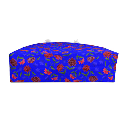 Floral Blue Weekender Bag — Bright Boho Travel Tote showcasing vibrant hand-drawn floral clusters on cobalt canvas, featuring sturdy cream rope handles and a spacious design for stylish, joyful travel.
