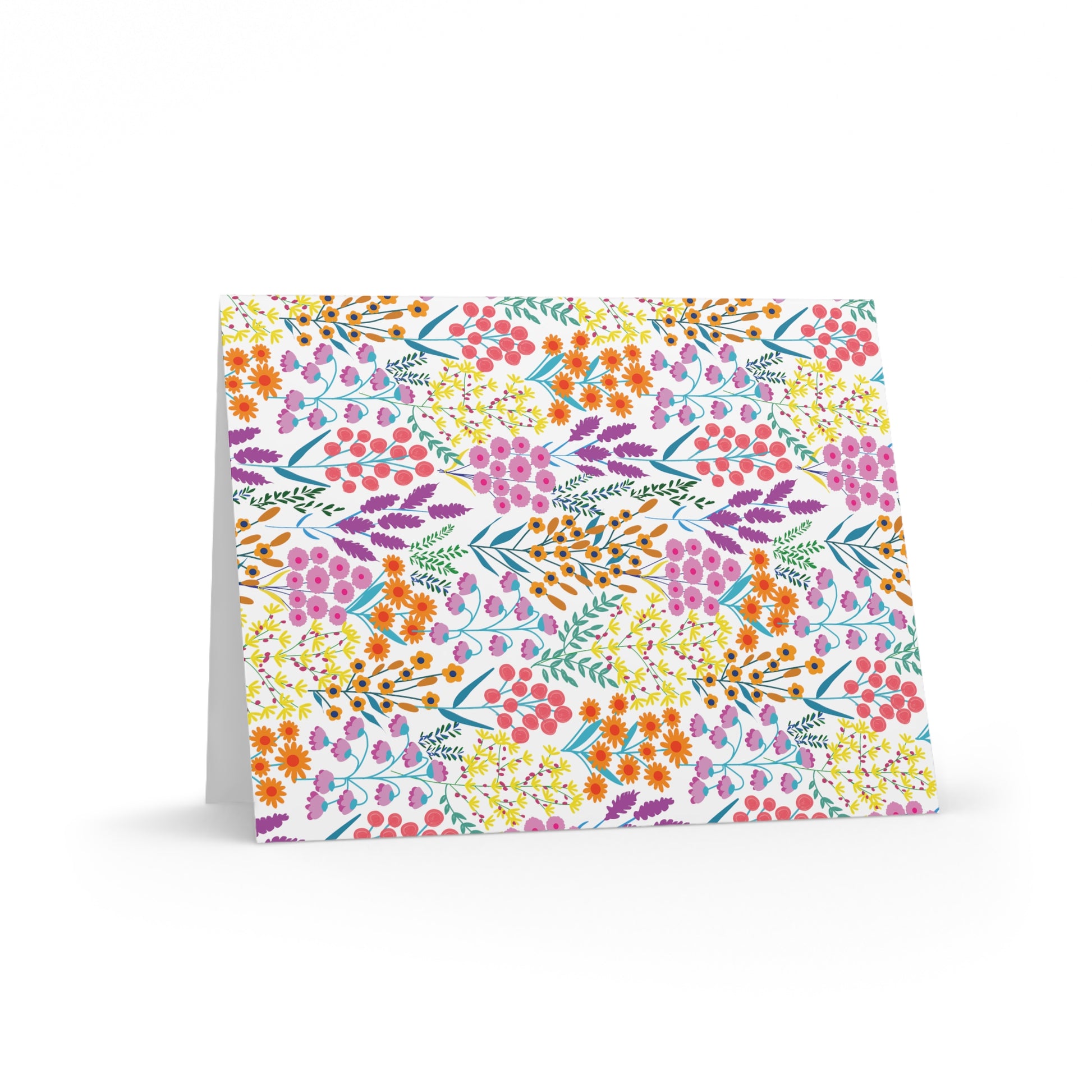 Floral Wildflower Greeting Cards — Pack of 8/16/24, featuring vibrant, hand-drawn wildflowers on a folded card, perfect for sending cheerful, springtime notes. Comes with matching white envelopes.