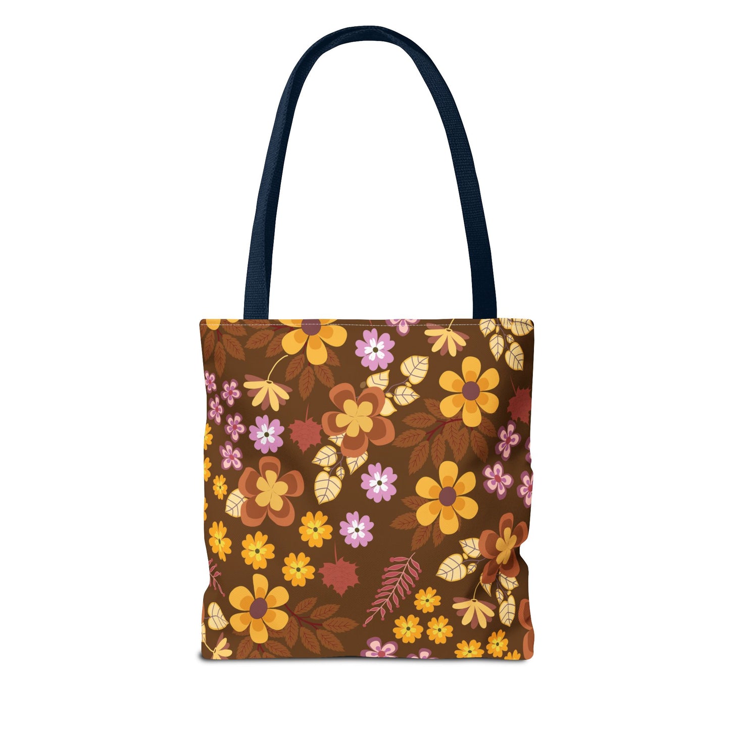 Floral Tote Bag with navy-blue shoulder straps, featuring a brown background adorned with vibrant yellow, orange, rust, and pale pink flowers. Ideal for summer outings, combining durability with cheerful, uplifting design.
