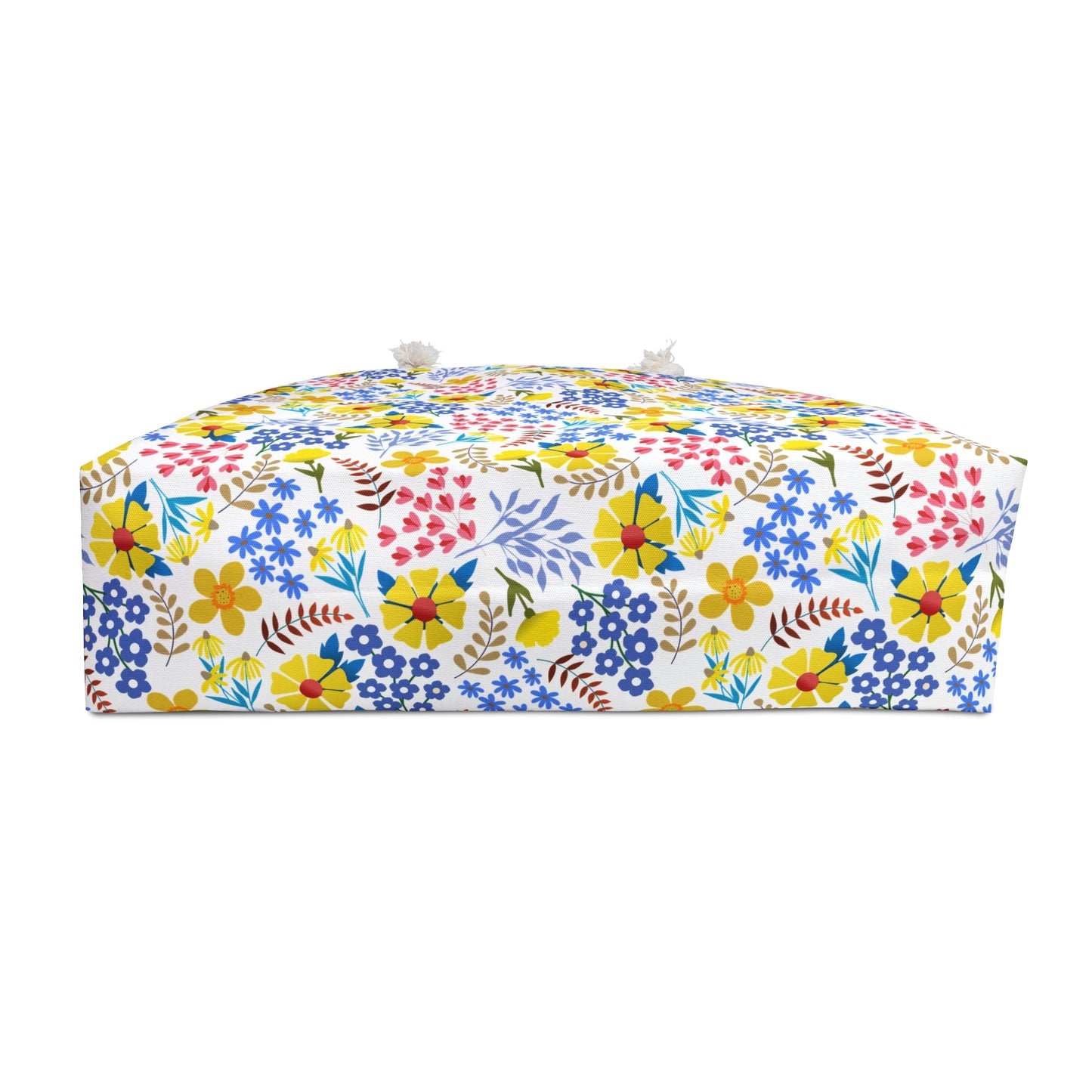 Weekender Bag with bright, multicolored floral pattern and fabric-loop handles, ideal for stylish travel. Designed by FireBrook Essentials to bring comfort and positivity to your journey.