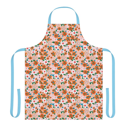 Floral Apron with vibrant orange and white blossoms, featuring sky-blue ties and a soft, stain-free polyester canvas, ideal for joyful cooking and crafting, embodying FireBrook Designs' commitment to style and comfort.