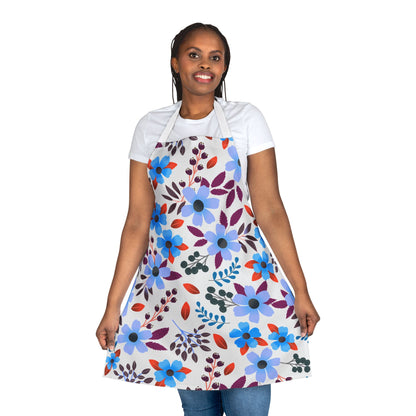 Person showcasing a Floral Apron from FireBrook Designs, featuring a vibrant floral pattern. Made from soft, stain-free polyester canvas, ideal for cooking or crafting, enhancing comfort and style.