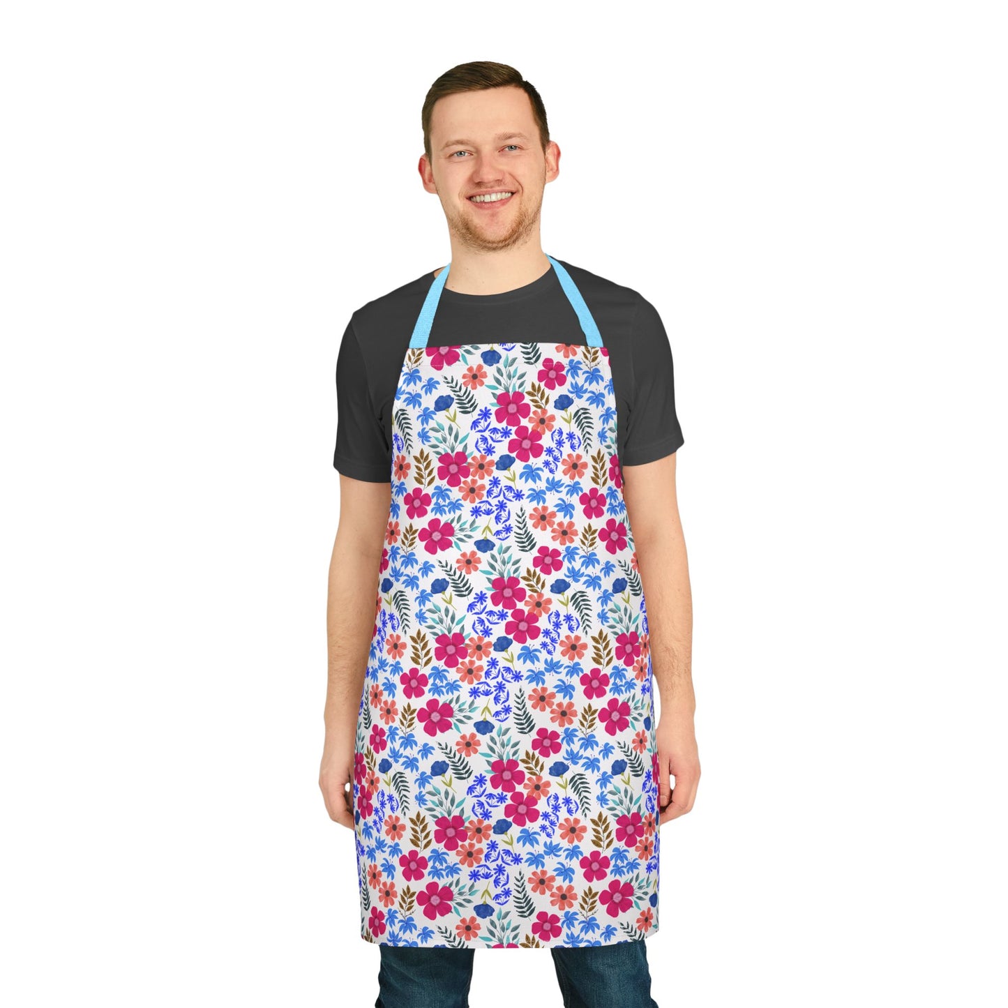 A young man models the Apron Floral Design, showcasing its vibrant floral pattern. Made from soft, stain-free polyester canvas, it’s perfect for adding joy and style to everyday tasks.