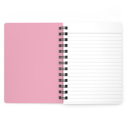 SPIRAL JOURNAL, DURABLE GLOSSY COVER, RULED, 5X7, PASTEL FIELD: Open, spiral-bound notebook with pink inside cover and lined white page, flat-laying, with durable glossy finish for smooth writing.