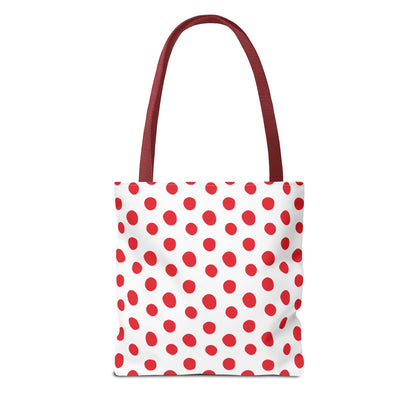 Red Polka Dots Tote Bag featuring a playful white and red polka dot pattern with a close-up of a sturdy red strap, ideal for everyday use, from errands to picnics.