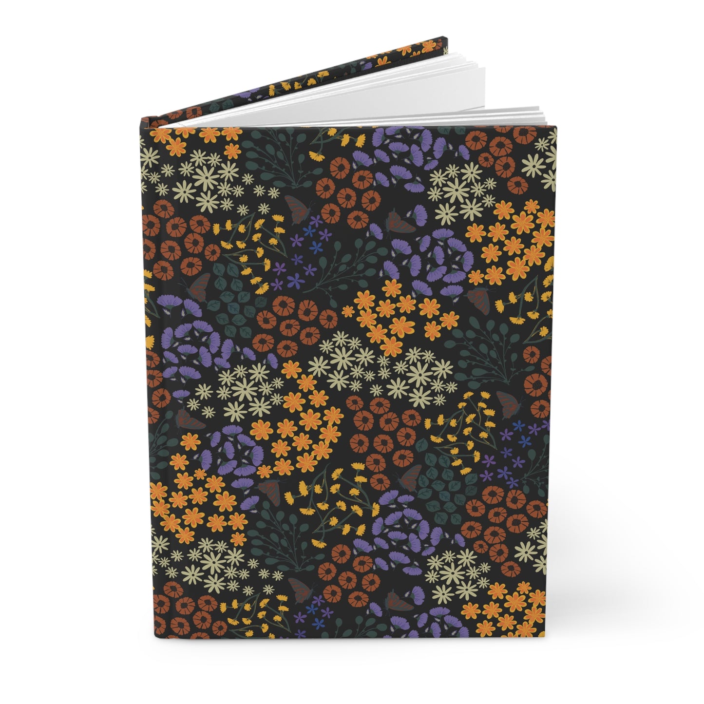 HARDCOVER JOURNAL, MATTE, RULED, 5X7, SEWN BIND, CLEAN-TEAR PAGES - AUTUMN NIGHT stands upright, showcasing its floral patterned cover and slightly open to reveal blank pages, embodying FireBrook Essentials' uplifting design ethos.