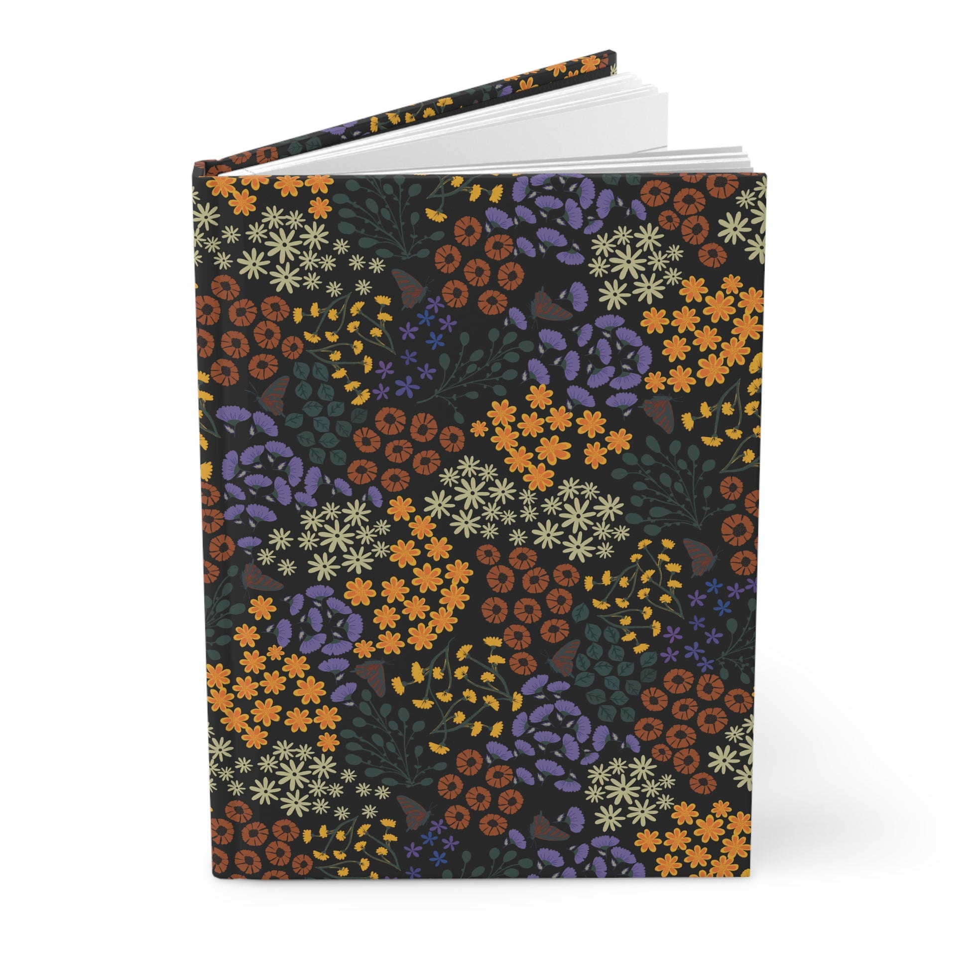 HARDCOVER JOURNAL, MATTE, RULED, 5X7, SEWN BIND, CLEAN-TEAR PAGES - AUTUMN NIGHT stands upright, showcasing its floral patterned cover and slightly open to reveal blank pages, embodying FireBrook Essentials' uplifting design ethos.