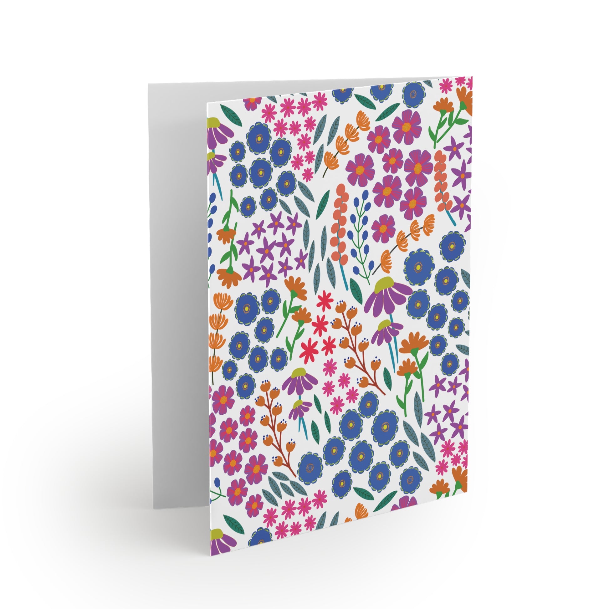 Floral Greeting Cards — Pack of 8/16/24 featuring a vibrant floral pattern on the cover, standing slightly open to reveal a blank interior, ready for your personal message or printed text.