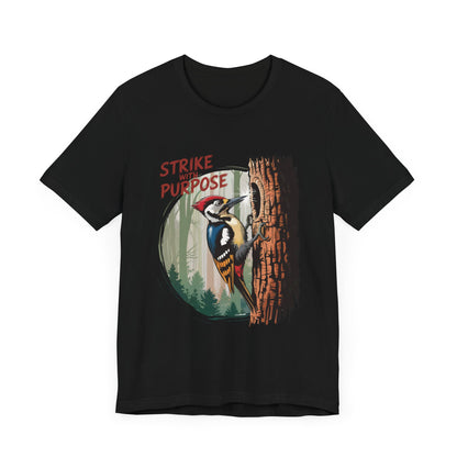 Woodpecker: Strike with a Purpose Bella+Canvas Unisex T-Shirt featuring a cartoon woodpecker peering through a tree hole, embodying motivation and nature-inspired style. Perfect for casual and outdoor wear.