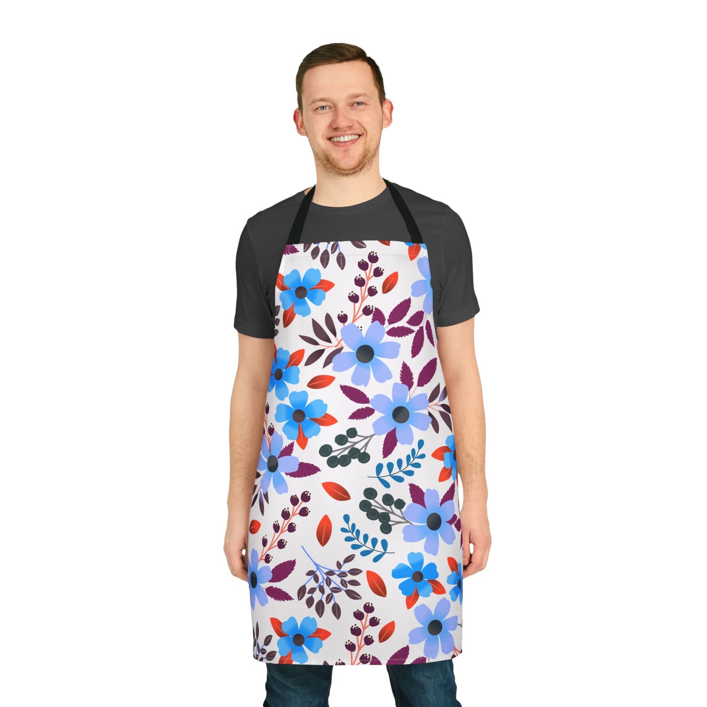 Floral Apron featuring vibrant blue and purple blossoms, worn by a smiling man. Crafted from soft, stain-free polyester canvas, ideal for cooking or crafting. Designed by FireBrook Essentials for comfort and joy.