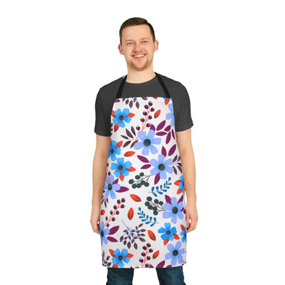 Floral Apron featuring vibrant blue and purple blossoms, worn by a smiling man. Crafted from soft, stain-free polyester canvas, ideal for cooking or crafting. Designed by FireBrook Essentials for comfort and joy.