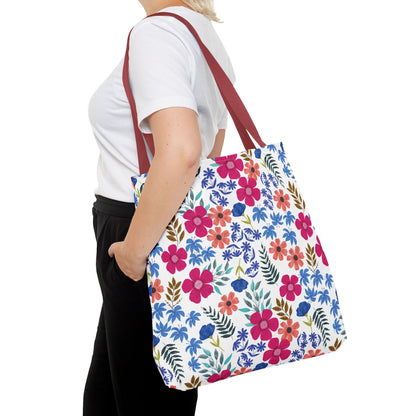 Confetti Wildflower Tote Bag with vibrant floral pattern and burgundy straps, carried by a person in casual attire, reflecting FireBrook Essentials' joyful, stylish design for versatile summer use.