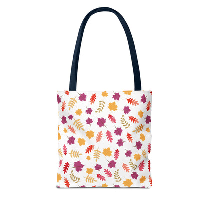 Autumn Leaves Tote Bag with dark straps, featuring a vibrant pattern of stylized fall leaves. Designed for durability with reinforced stitching and boxed corners, ideal for everyday essentials.