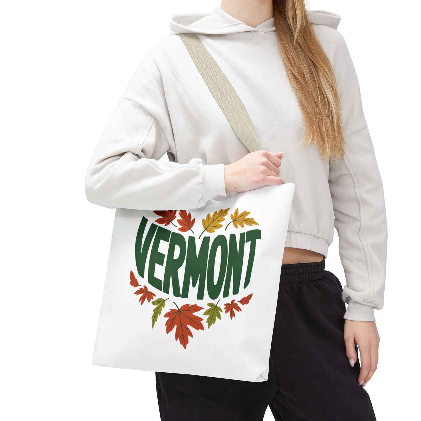 Close-up of a person holding the Vermont Tote Bag, showcasing its durable 100% polyester material and reinforced stitching. Ideal for daily essentials, aligning with FireBrook Essentials' focus on stylish, practical design.