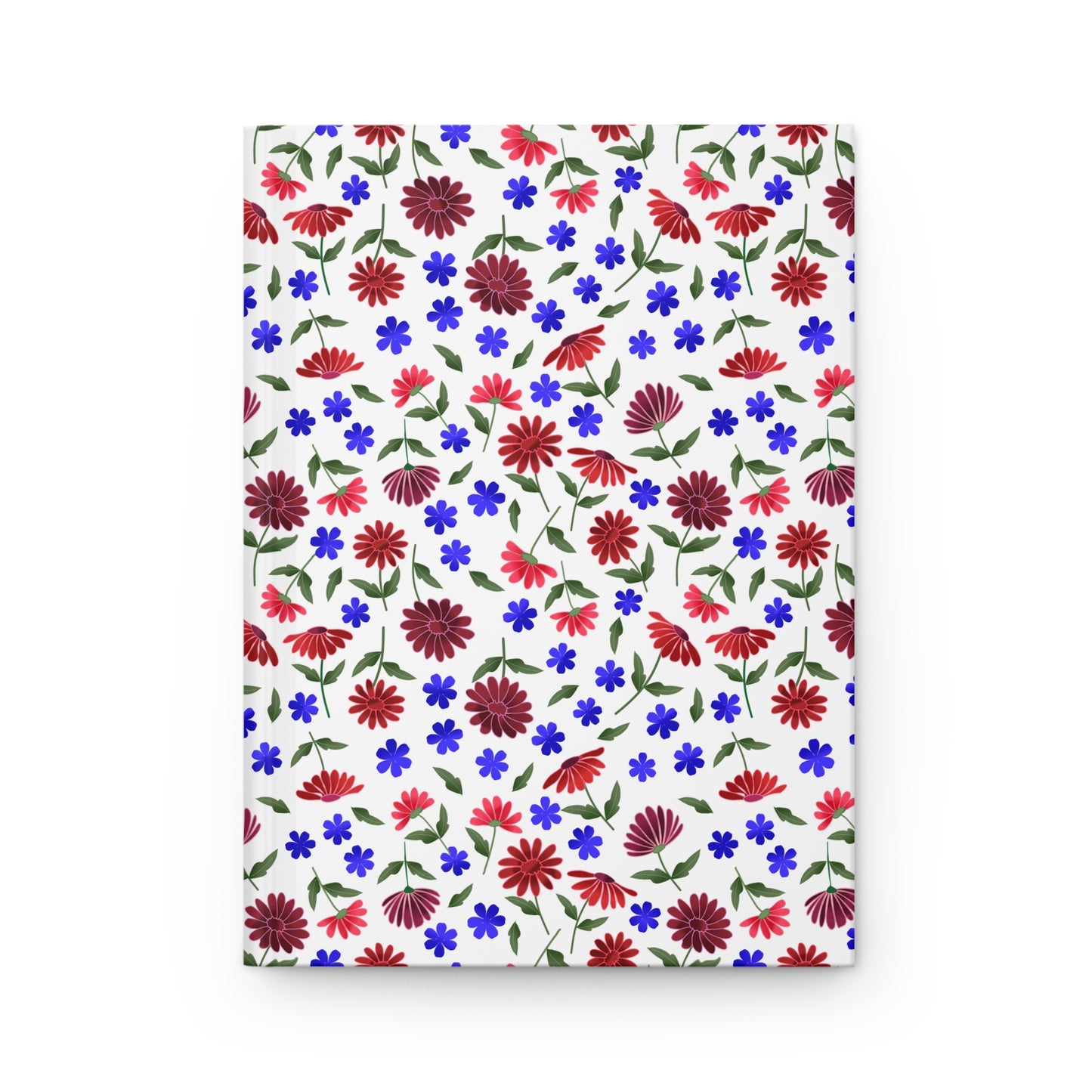 Floral Ditsy Hardcover Journal — Red & Blue Wildflower Notebook features a seamless floral pattern with red daisies and blue flowers on a white cover, embodying FireBrook Essentials' joyful, uplifting design ethos.