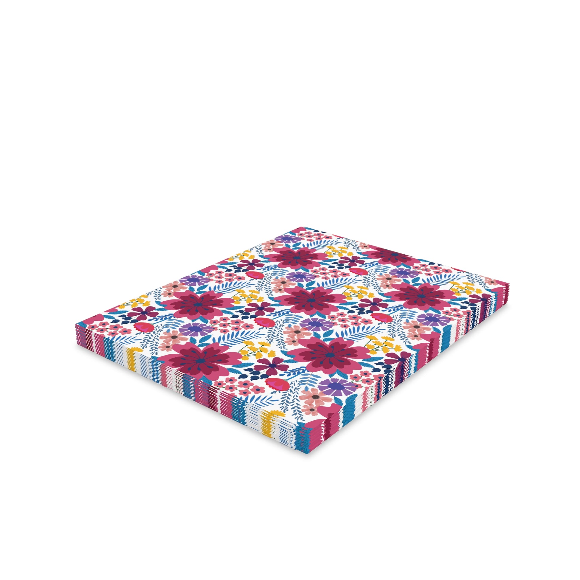 Floral Wildflower Greeting Cards — Pack of 8/16/24 feature a vibrant stack of decorative paper napkins with multicolored floral patterns, showcasing large blossoms and smaller flowers, embodying FireBrook Designs' joyful, uplifting aesthetic.