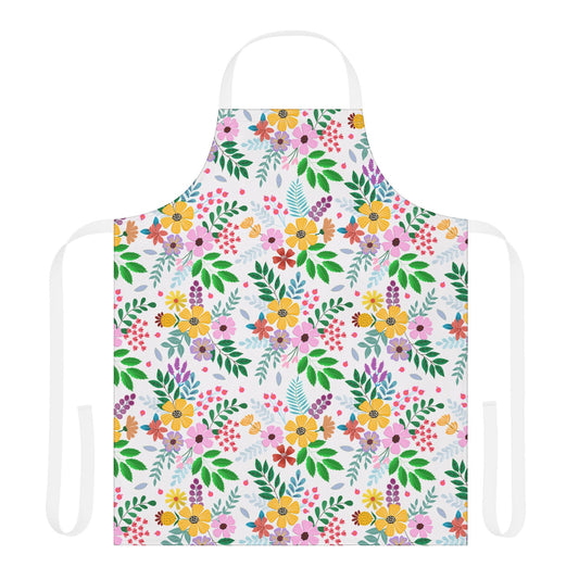 Floral Apron featuring vibrant, all-over floral print with clusters of flowers and leaves on white polyester canvas. Includes white waist ties and neck strap, designed for comfort and style.