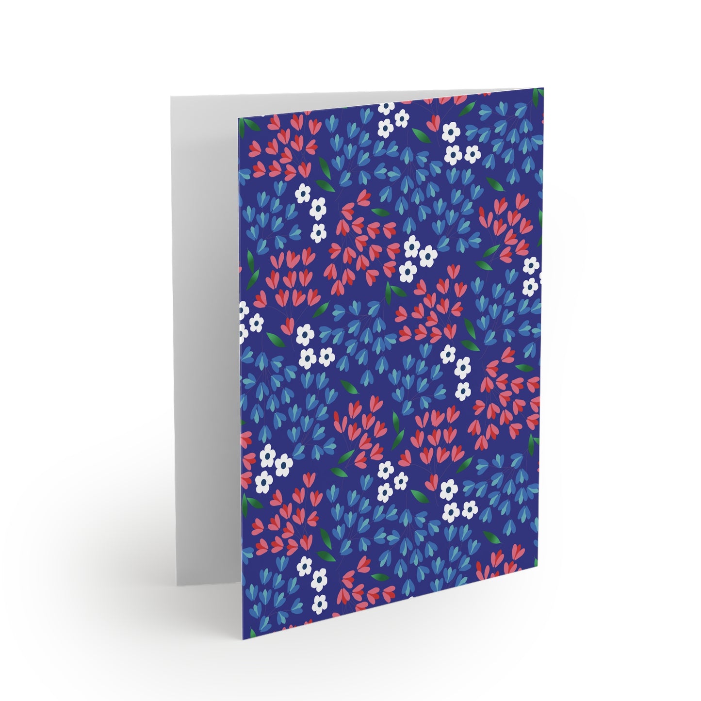 Floral Wildflower Greeting Cards — Pack of 8/16/24 feature a folded design with vibrant red and light-blue petal clusters, plus tiny white flowers on a navy background, perfect for heartfelt messages.