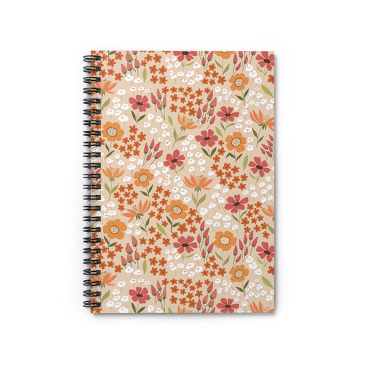 Floral Spiral Notebook with vibrant orange, rust-red, and white blossoms on a beige cover, featuring a sleek metal spiral binding, ideal for creative and organized note-taking from FireBrook Designs.