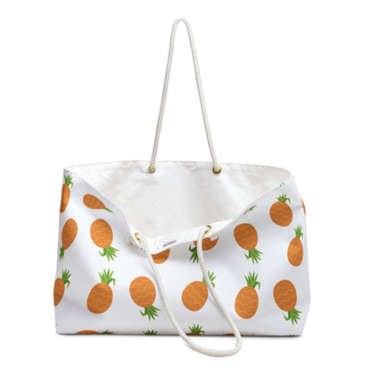 Weekender Bag - Pineapple Pattern: A stylish, durable bag with orange pineapple prints, cream rope handles, and a spacious interior, perfect for summer trips and embodying FireBrook Designs' joyful, uplifting style.