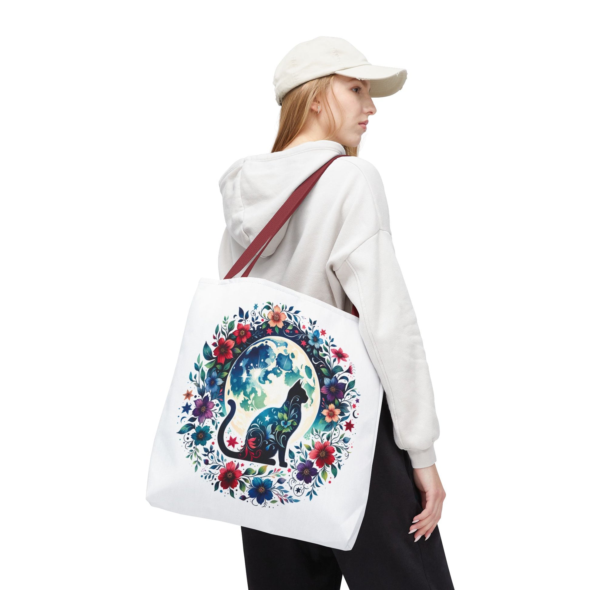 Lone Cat Under the Moon Tote Bag showcases a whimsical cat design, perfect for feline enthusiasts. Crafted from durable polyester with reinforced handles, this playful accessory aligns with FireBrook Essentials' joyful, uplifting ethos.