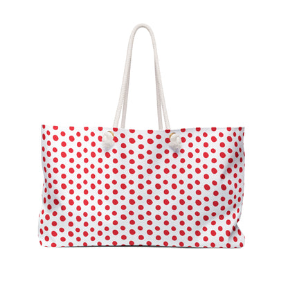 Weekender Bag - Red (small) Polka Dots: Close-up of a stylish tote with red polka dots, featuring durable rope handles and a spacious interior, perfect for vibrant, joyful travel adventures.