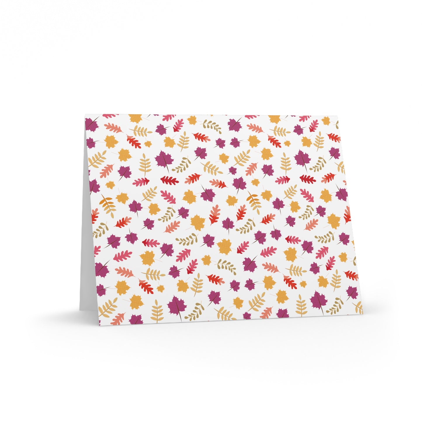Autumn Greeting Cards — Pack of 8/16/24, featuring a vibrant, stylized leaf pattern in autumn hues on the front, folded and paired with a matching white envelope. Ideal for expressing gratitude or celebrating moments.