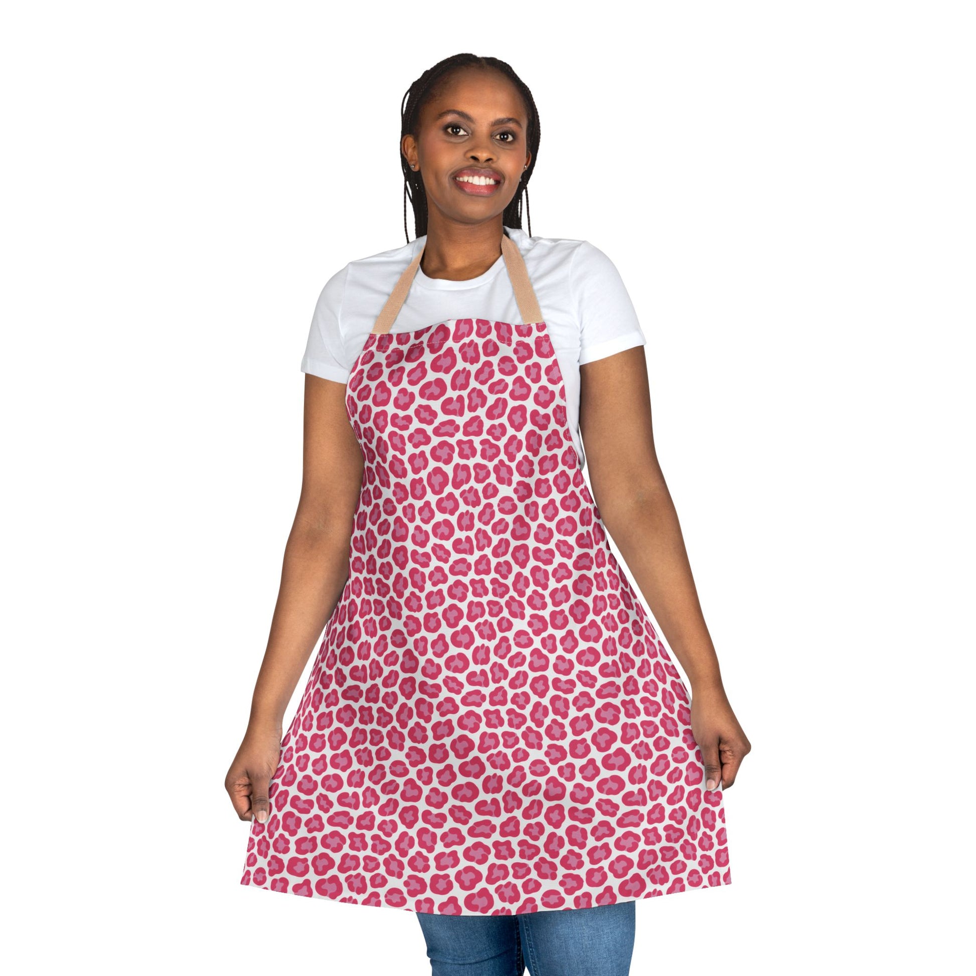 Woman wearing FireBrook Designs' Apron, Cheetah Print, showcasing its stylish and functional design with adjustable straps and soft polyester fabric, ideal for trendy home chefs and bakers.