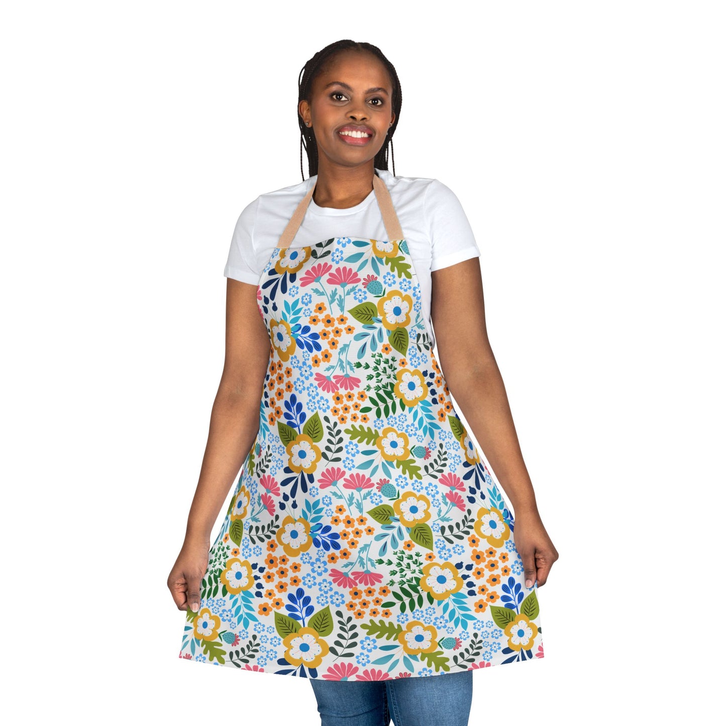 Smiling woman models the vibrant Floral Apron with a colorful floral pattern, offering stain-free protection. Made of soft, comfortable polyester canvas, perfect for joyful cooking or crafting.