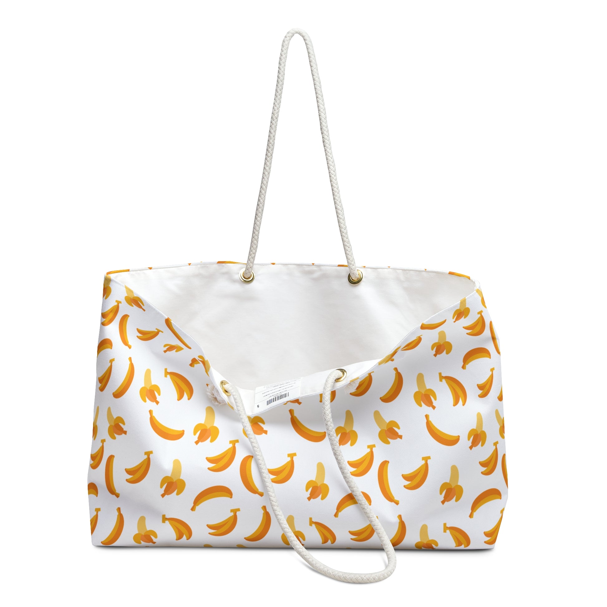 Weekender Bag - Banana Pattern: A stylish, large weekender bag with a playful banana design, featuring durable rope handles, ideal for travel enthusiasts seeking a unique and functional accessory from FireBrook Designs.
