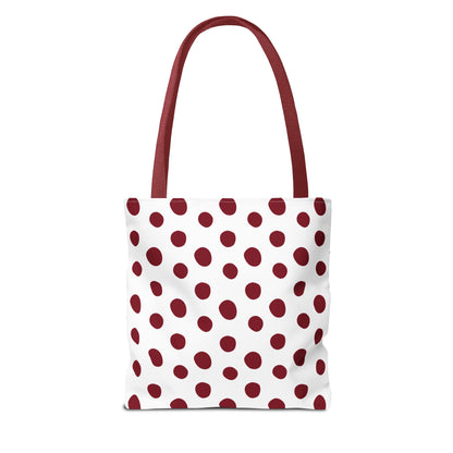 Burgundy Polka Dots Tote Bag with red and white polka dots and a sturdy red strap. Ideal for everyday use, this stylish accessory embodies FireBrook Designs' commitment to practicality and joy.