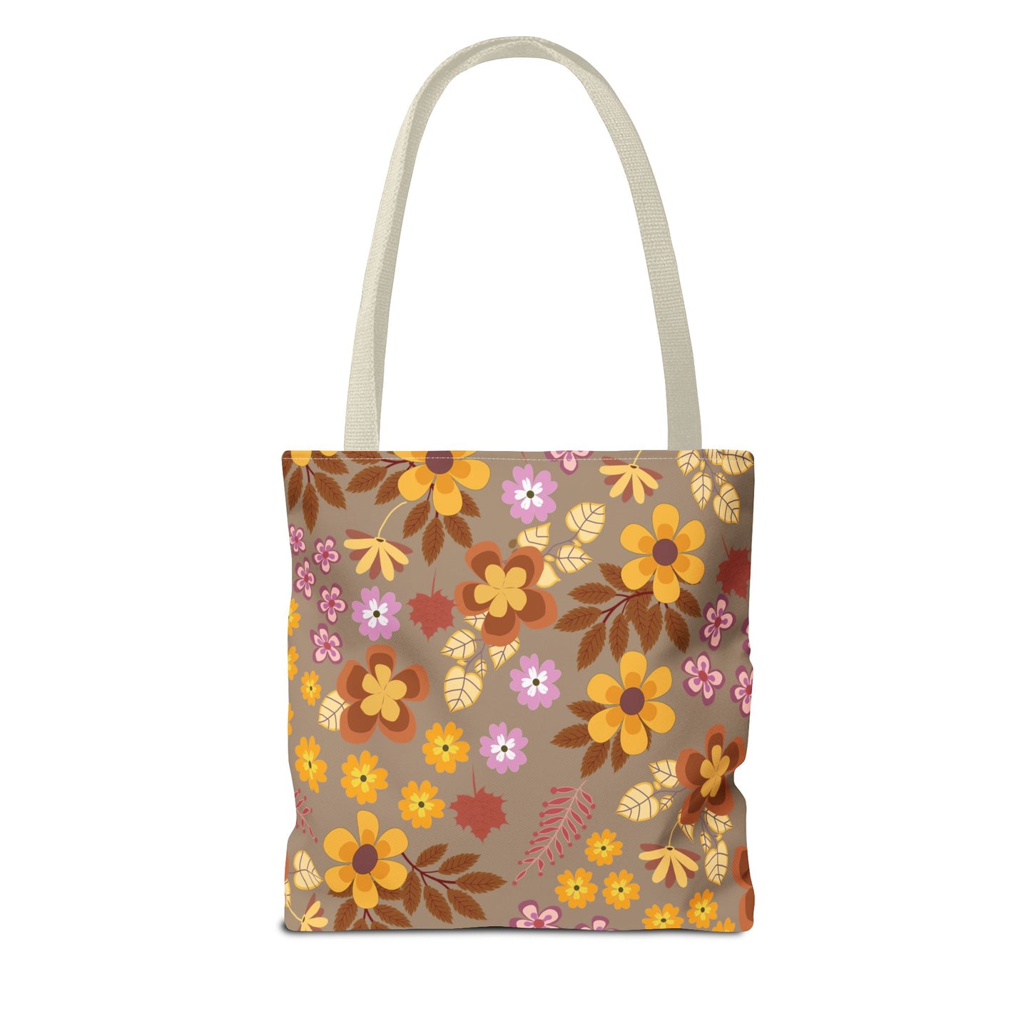 Harvest Brown Bloom Tote Bag features an autumn-inspired floral pattern with orange, gold, rust, and pink blooms against a muted brown background, complemented by a cream-colored shoulder strap for stylish outings.
