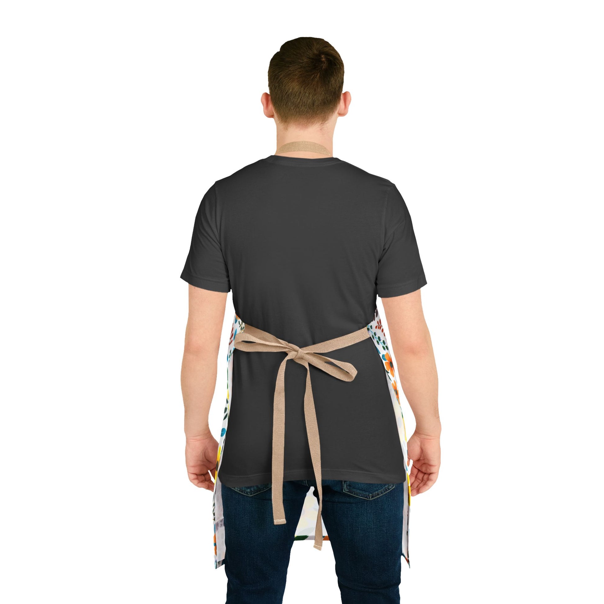 Floral Apron in dark charcoal-gray with vibrant side panels, featuring a tan tie-back closure, designed for comfort and style. Ideal for various activities, embodying FireBrook Essentials' commitment to joyful, practical designs.