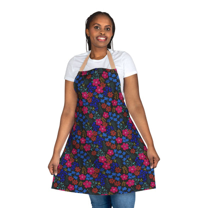 Person models the Apron Floral Design featuring vibrant floral print, tan neck strap, and wide skirt. Made from soft, stain-free polyester canvas, ideal for adding charm and comfort to cooking or crafting.